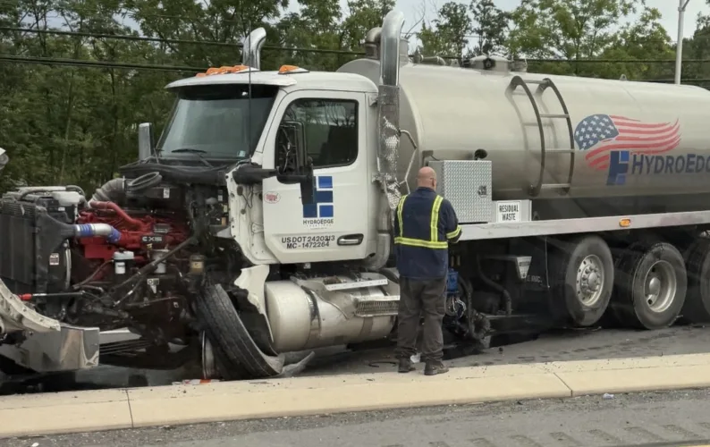 Water truck hits construction vehicle on Route 220